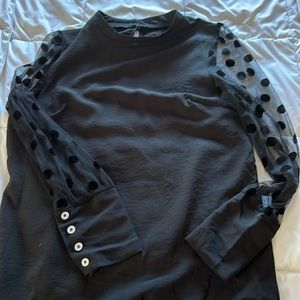 Sheer long sleeves black top with polka dots. 4 button cuffs solid front & back
